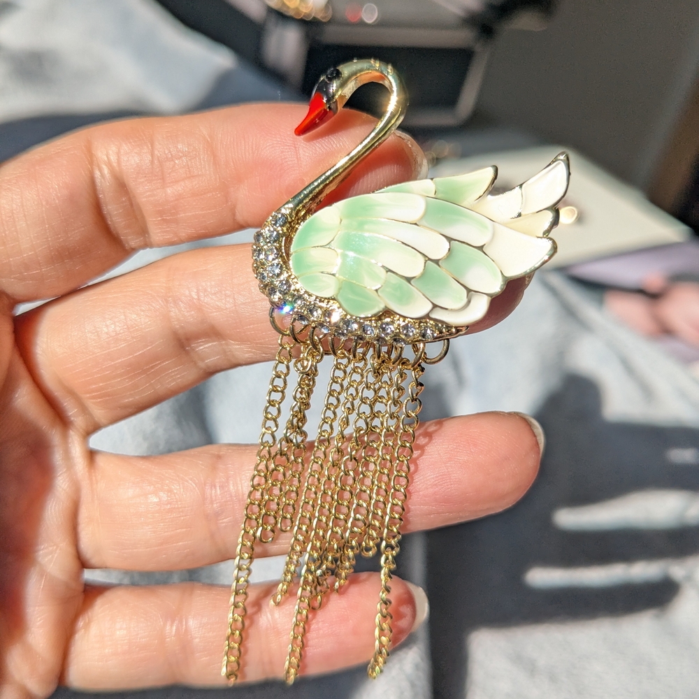 Elegant Green Enamel Swan Brooch with Gold Chains